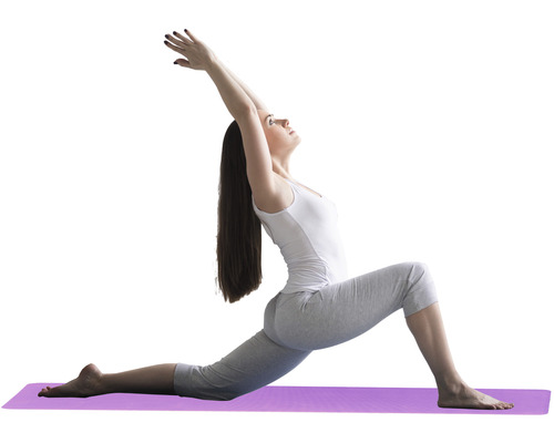 Frau in Yoga-Pose auf Yogamatte