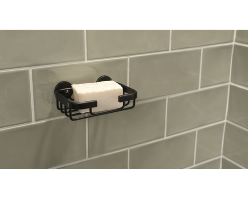 Seifenhalter mit Seife an gefliester Wand