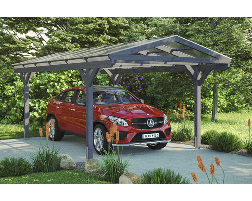 Ein Carport aus Holz mit einem Auto darunter im Garten.