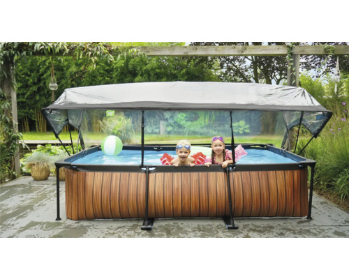 Aufblasbarer Pool mit Überdachung und zwei Kindern im Garten