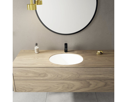 Modernes Badezimmer mit Waschtischunterschrank, Aufsatzwaschbecken und rundem Spiegel