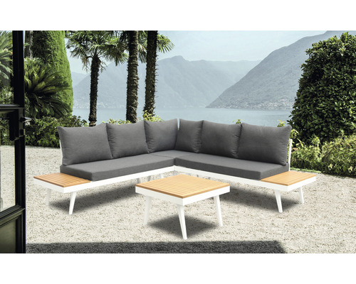Gartenlounge-Set mit Ecksofa, Tisch und grauen Kissen vor Bergkulisse