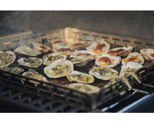 Gegrillte Austern auf einem Grillrost