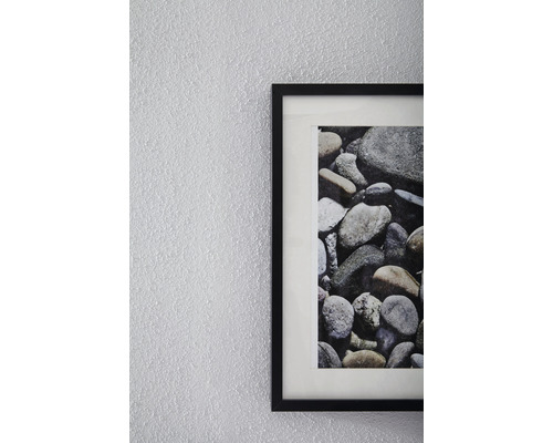 Gerahmtes Bild mit Steinmotiv an der Wand