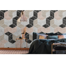Wandgestaltung mit dreidimensionaler geometrischer Tapete im Schlafzimmer.