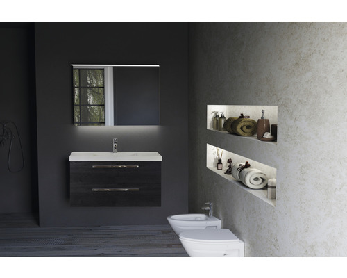 Modernes Badezimmer mit Waschtisch, Spiegel, Bidet und Toilette