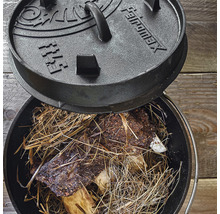 Gusseiserner Dutch Oven mit Deckel und Speisen