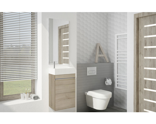 Modernes Badezimmer mit Waschtisch, Spiegelschrank, WC und Heizkörper