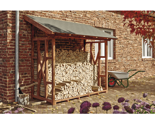 Kaminholzunterstand SKAN HOLZ Paul 2 240 x 100 x 243 cm nussbaum Holzlager gefüllt mit Holz vor einer Backsteinmauer