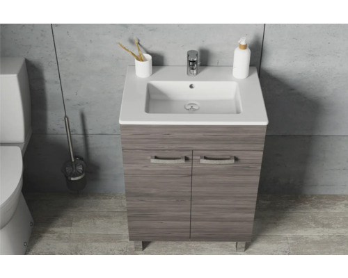 Waschtischunterschrank mit Waschbecken und Armatur im Badezimmer.