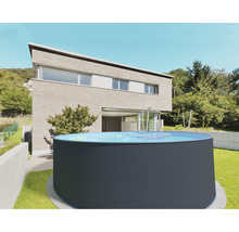 Rundes Aufstellbecken im Garten vor einem Haus