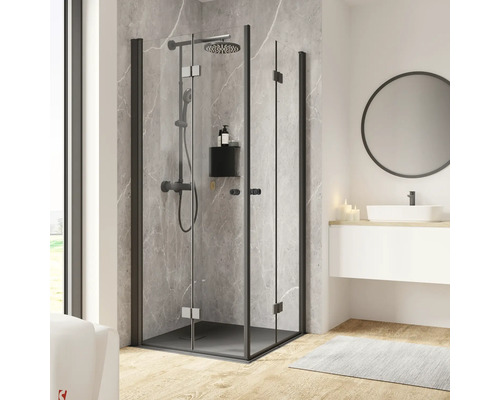 Eckeinstieg mit Drehfalttür SCHULTE Garant 2.0 ExpressPlus 90 x 90 cm Profil schwarz Klarglas schmutzabweisende Glasbeschichtung Türanschlag links Türanschlag rechts Puffergriff Fliesenmontage Begehbare Eckdusche mit schwarzem Rahmen und Duschsystem in einem Badezimmer.