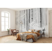 Schlafzimmer mit Fototapete Winterwald, Bett und Holzfußboden