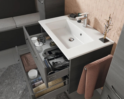 Waschtischunterschrank mit Auszügen und Waschtisch im Badezimmer