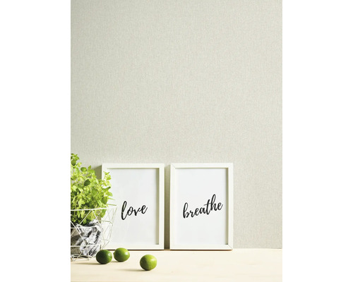 Dekorative Tapete mit Pflanze und Bildern mit den Worten Liebe und Atmen