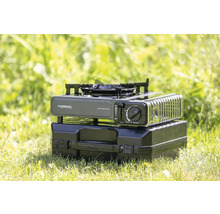 Campingaz Kocher mit Transportkoffer im Gras