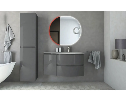 Modernes Badezimmer mit Waschtisch, Spiegelschrank und beleuchtetem Spiegel