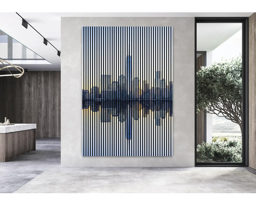 Dekoratives Wandbild mit Skyline-Motiv in einem modern eingerichteten Raum