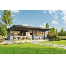 Modernes Gartenhaus mit Küche, Essbereich und Wohnzimmer auf einer Rasenfläche.