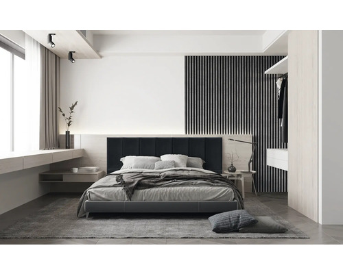 Schlafzimmer mit Bett, Nachttisch und Beleuchtung