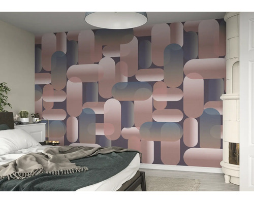 Schlafzimmer mit einer Wand mit Tapete mit geometrischen Formen.