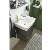 Waschbeckenunterschrank mit zwei Schubladen, Aufsatzwaschbecken, Armatur und Accessoires im Badezimmer