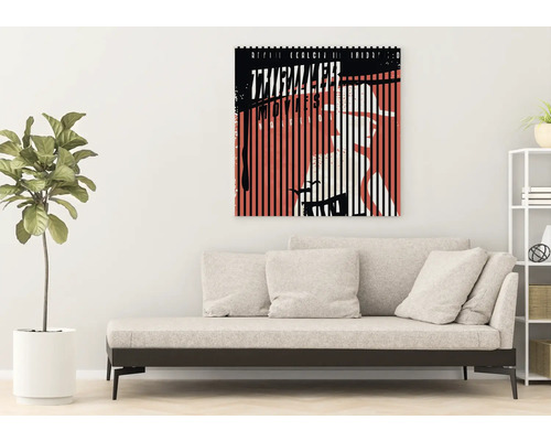 Dekoratives Leinwandbild mit grafischem Motiv über einem Sofa