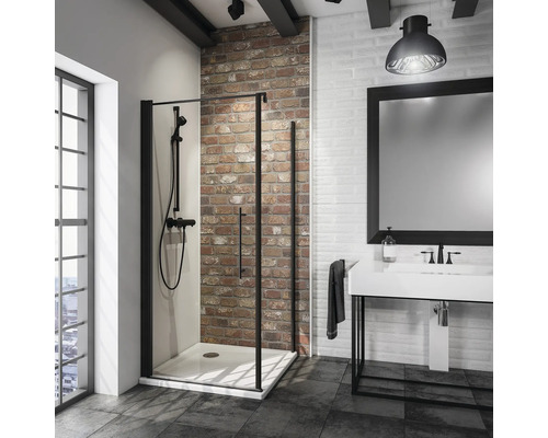 Duschtür mit Seitenwand mit Drehtür SCHULTE Alexa Style 2.0 Black Style ExpressPlus 90 x 90 cm Profil schwarz Klarglas schmutzabweisende Glasbeschichtung Modernes Badezimmer mit Dusche, Waschbecken und Spiegel in einem Raum mit Ziegelwand.