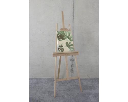 Holzstaffelei mit Leinwand und Monstera-Blatt-Motiv