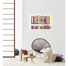Wohnzimmer mit Teppich, Sessel, Wandbild und Beistelltischen