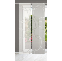 Schiebegardine mit Ringmuster vor einem Fenster