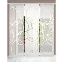 Dekoschals mit Kreisdesign vor einem Fenster