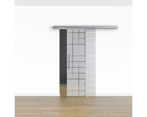 Schiebetür aus Glas mit grafischem Muster in einem Raum