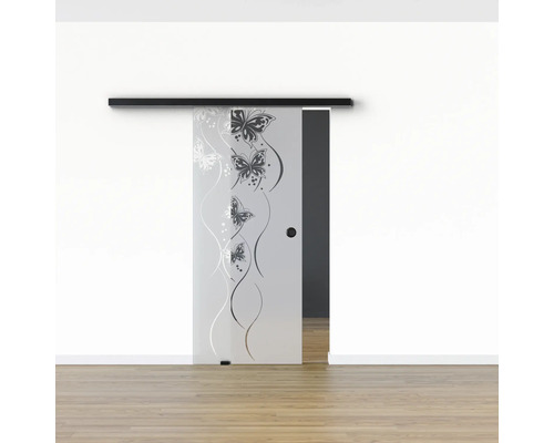 Schiebetür aus Glas mit Schmetterlingsmuster und schwarzer Schiene an einer Wand