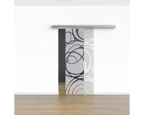 Schiebetür aus Glas mit Kreismuster im Raum