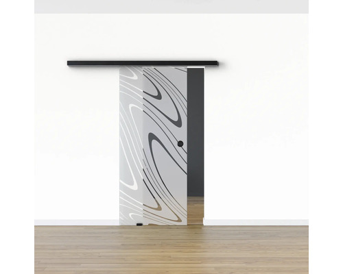 Schiebetür aus Glas mit Muster vor einer Wand