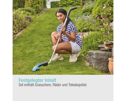 Frau benutzt Grasschere mit Teleskopstiel im Garten