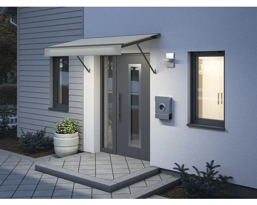 Eingangsbereich eines Hauses mit Vordach, Tür, Fenster und Briefkasten