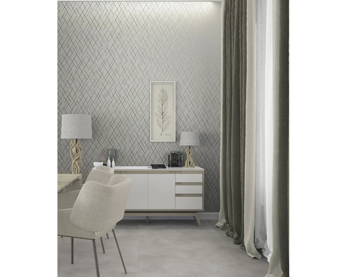 Modernes Esszimmer mit Kommode, Lampen und geometrischer Tapete