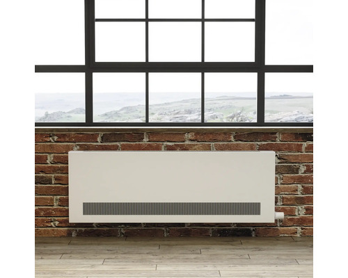 Heizkörper an einer Ziegelwand unter einem Fenster