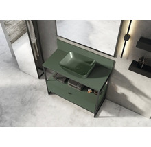 Badezimmer mit Waschtischunterschrank und Aufsatzwaschbecken in einem hellen Raum.