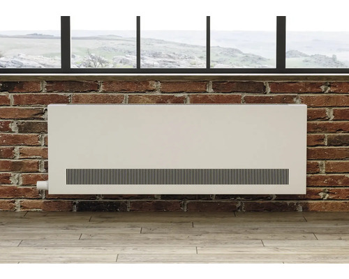 Heizkörper vor einer Ziegelwand unter einem Fenster