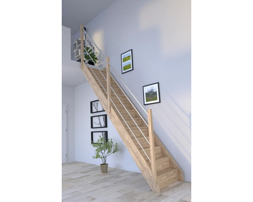 Holztreppe mit Edelstahlgeländer in einem hellen Raum mit Bildern an der Wand und Pflanzen