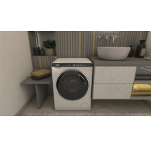Badezimmer mit Waschbecken, Waschmaschine der Marke Haier und Handtüchern