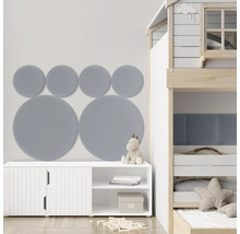 Kinderzimmer mit Akustikpaneelen in Kreisform, weißem Schrank und Etagenbett