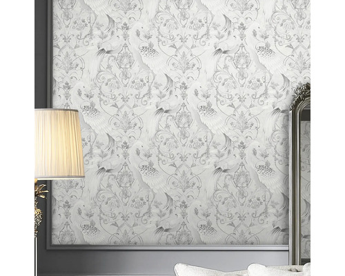 Tapete mit Vogel- und floralem Muster an der Wand