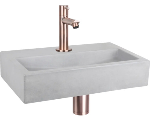 Waschtisch aus Beton mit Wasserhahn