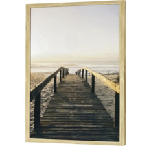 Gerahmtes Bild mit einem Holzsteg zum Strand