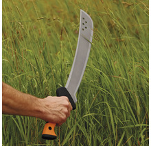 Machete mit Handschutz vor Gras