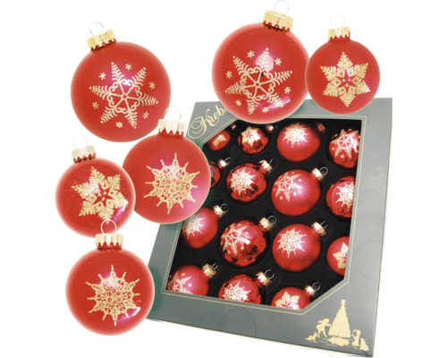 Rote Christbaumkugeln mit Schneeflockenmuster und Verpackung